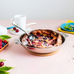 Poêle haute Mutine Cristel 28 cm utilisée pour préparer une paella