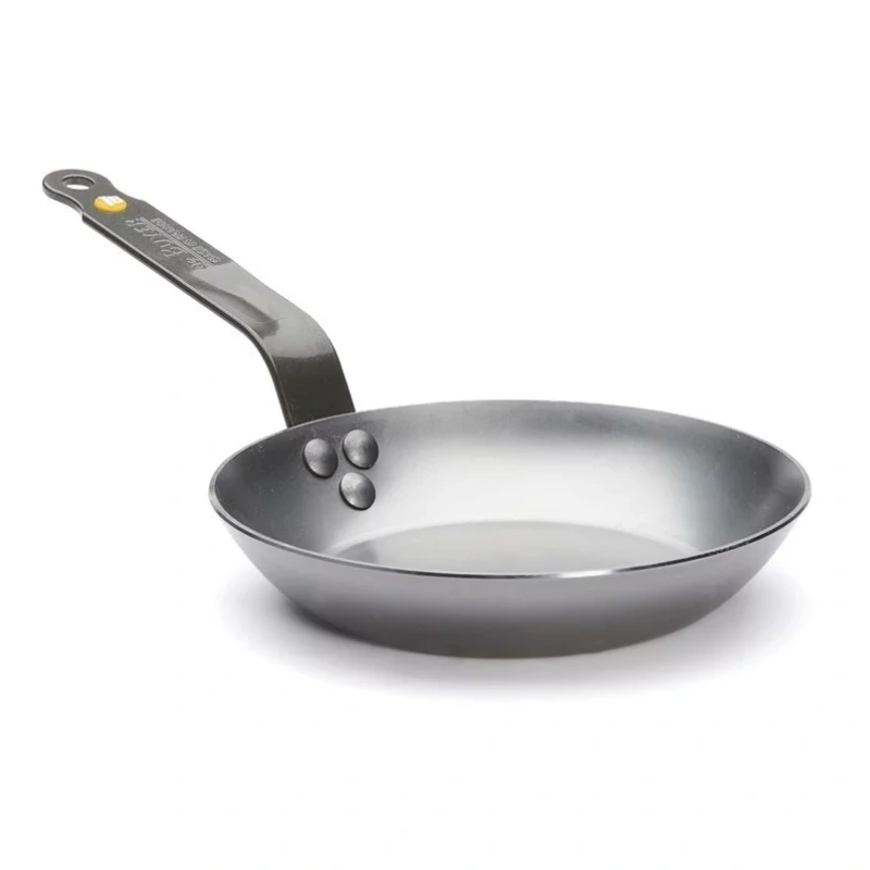 Poêle en inox sans revêtement idéale pour saisir et cuire à haute température